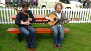 Steve and Fin Moore tuning up ootside oor Story Tent at Gardening Scotland